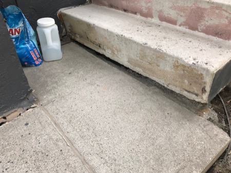 sinking concrete sidewalk
